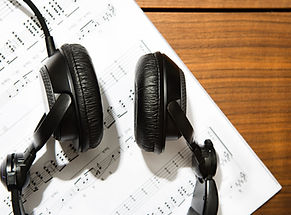 Headphones and sheet music