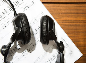 Headphones and sheet music