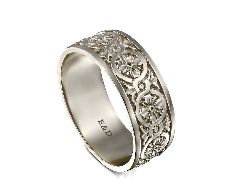 טבעת נישואין רחבה מעוצבת לגבר ולאישה,  טבעת נישואין בסגנון ארט דקו ב  שילוב סמל האינסוף ודקורציה פרחונית בהשראת הטבע זהב לבן