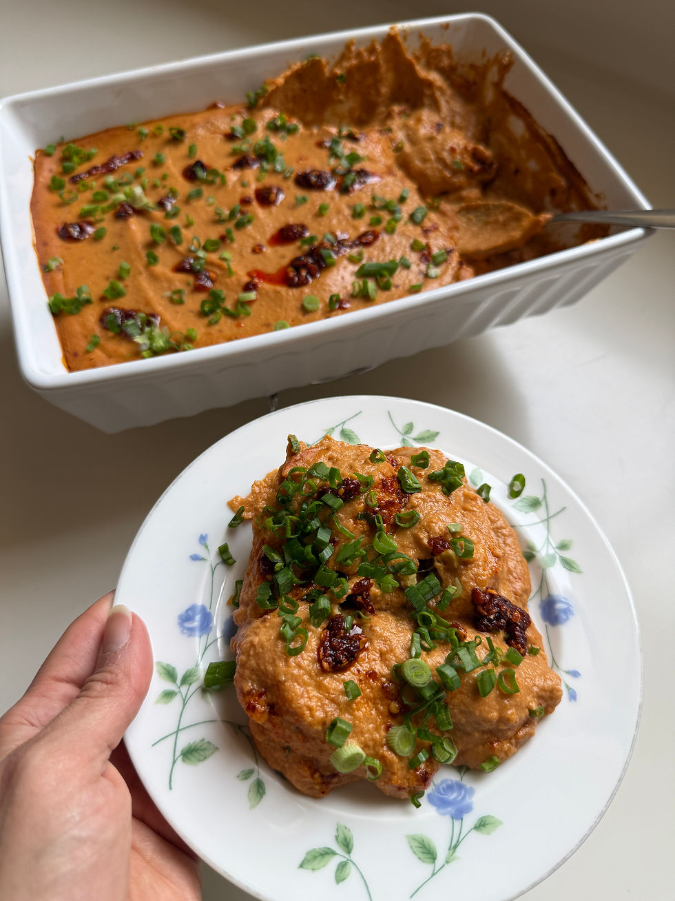 Cheesy Schezwan Momo Bake