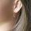 Thumbnail: TINY red matte glass sterling silver dangle earrings