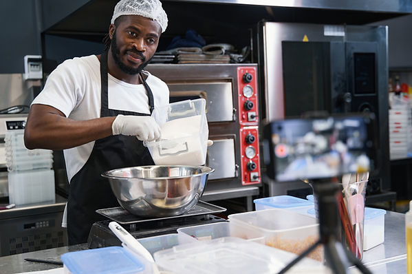 Afrokan Kitchen chef prepping food for orders