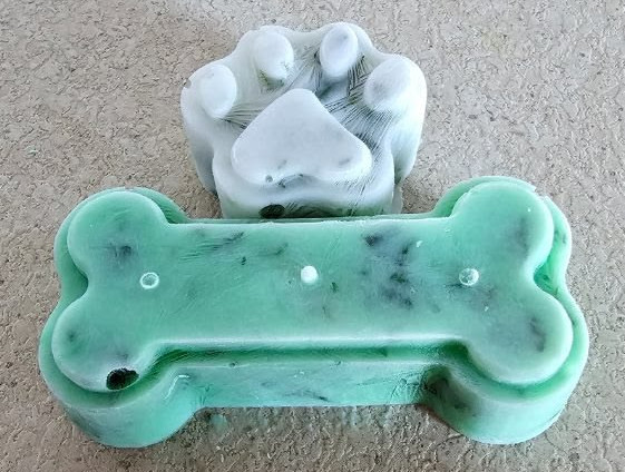 Bone and paw shaped treats for Goldendoodle puppy care