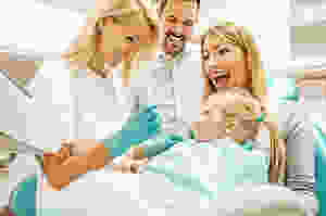 Parents with daughter at dentist
