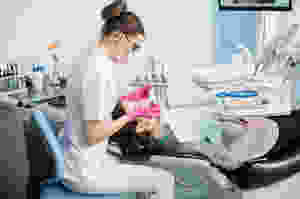 Dentist working on patient’s teeth