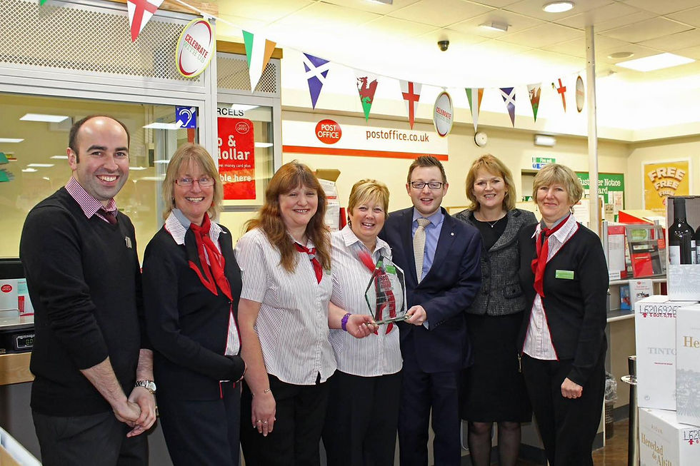 Duncan Baker back in 2015 when he a sub-postmaster of a Budgens store in Aylsham. Credit: Duncan Baker MP Facebook