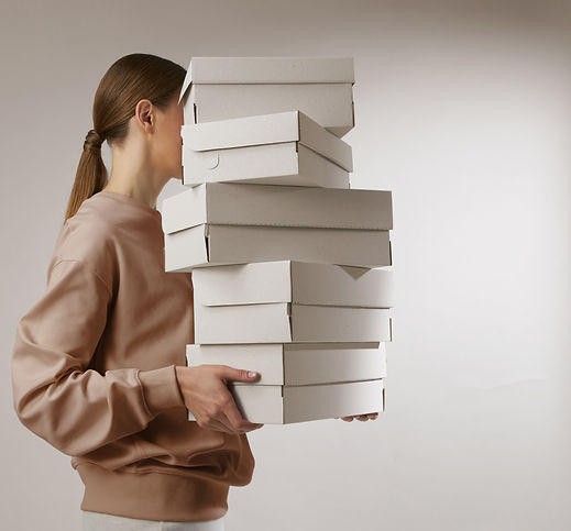 Carrying Shoe Boxes_edited_edited.jpg