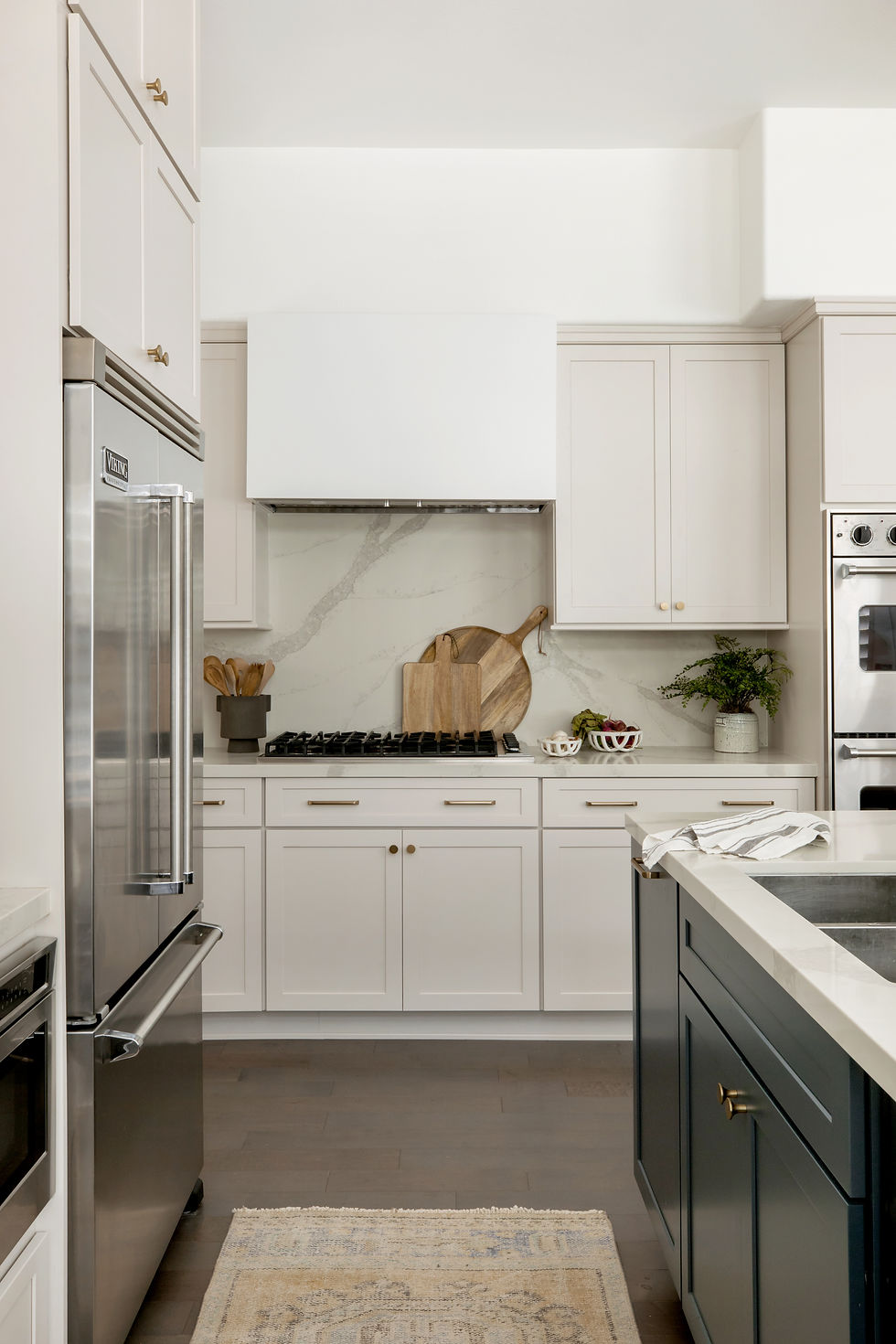 greige kitchen with quartz counters by Lindsey Brooke Design
