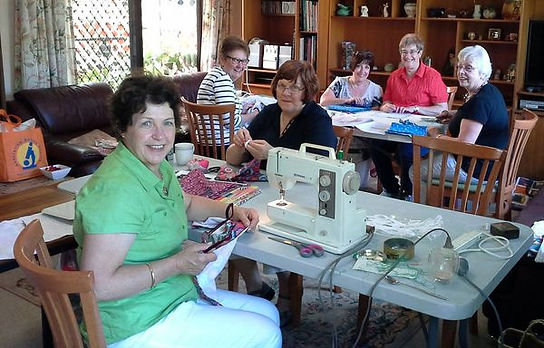 A team from Mitcham Roytary SA sewing and cutting supplies for Days for Girls