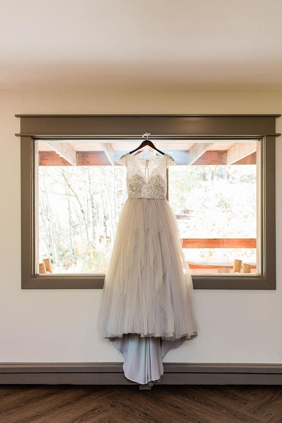 Wedding dress hangs at the Wild Basin Lodge
