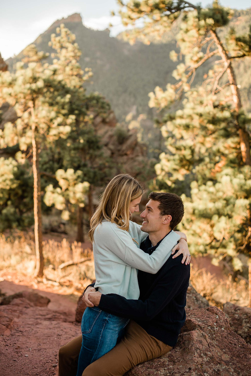 Engaged Couple in Boulder with red rocks