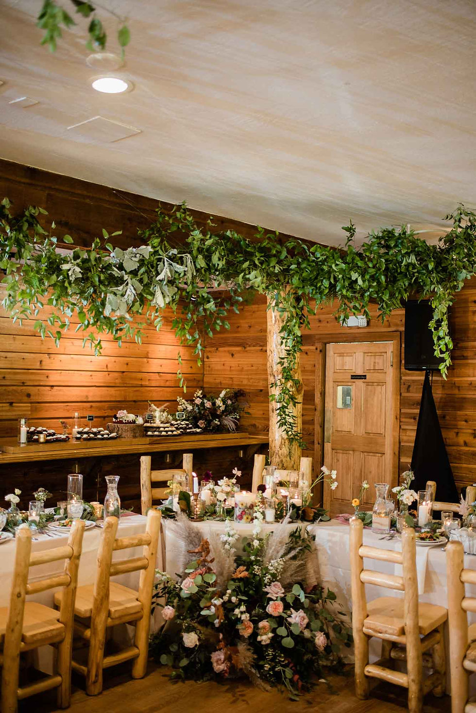 Reception table decorations at the Wild Basin Lodge in Allenspark, CO