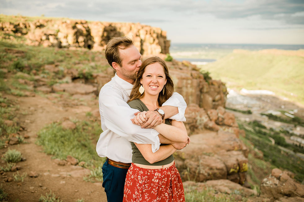 Couple hug on hiking trail in Golden, CO