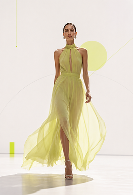 MODEL-WALKING-IN-GREEN-LIME-DRESS.png