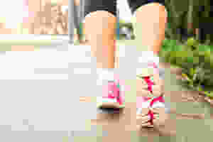 A woman going for a walk outside.