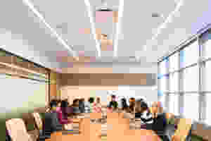 A group of people at a meeting.