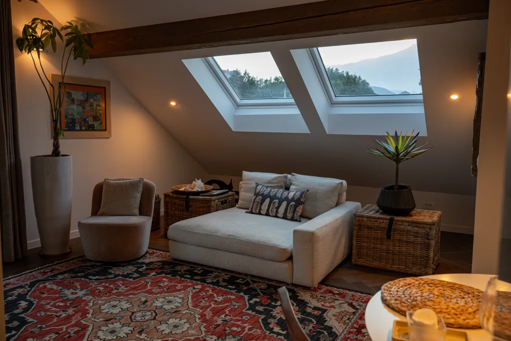 Maxi’s Penthouse living area with wooden floors and roof windows
