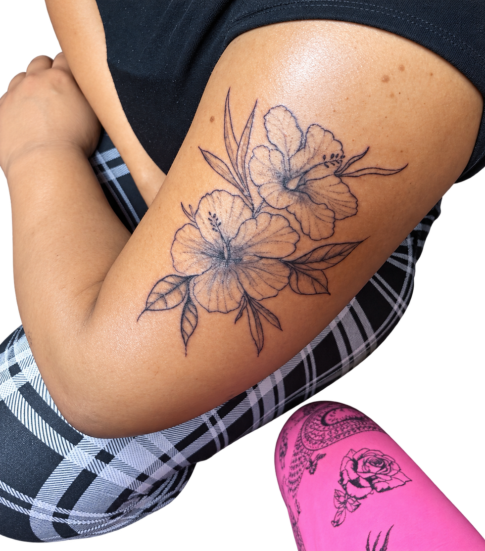Floral Tattooed Thigh and Patterned Shorts.png