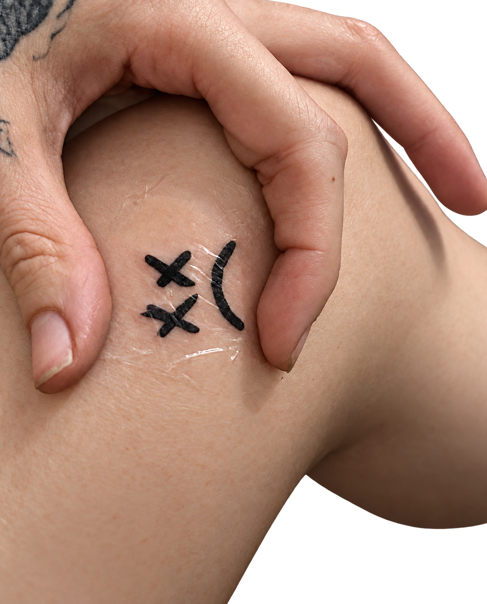 Tattooed skin and hand cutout.png