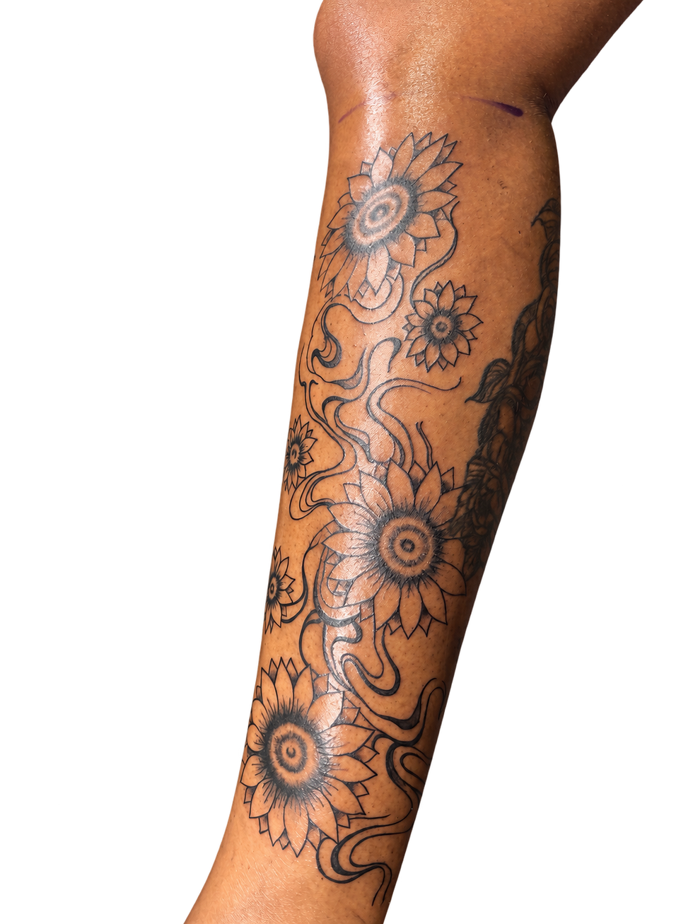 Tattooed arm isolated on transparent background.png