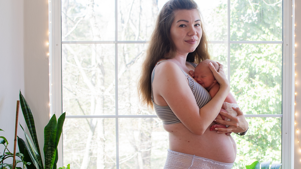 Daisy doula services supporting a new parent and newborn bonding skin to skin during the postpartum period in Knoxville, TN