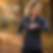 Jogger looking at watch on a fall path
