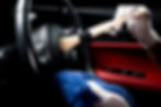 Car detailing series, Man use brush cleaning on hand wheel..jpg