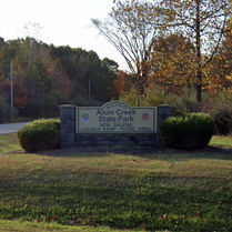 The road sign indicating the Alum Creek State Park