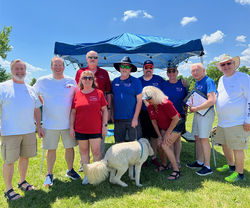 A group shot of boat safety inspection specialists