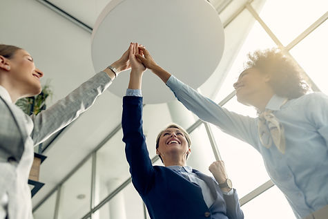 view-happy-businesswomen-gathering-hands-unity.jpg