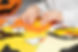 child-creates-pumpkin-out-paper-origami-halloween-preparation.jpg