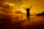 relax-woman-jumping-sea-beach.jpg