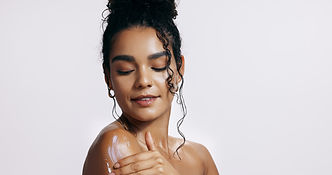 Studio, shine and cream of woman, confident and treatment of skincare, soft and glow of bo