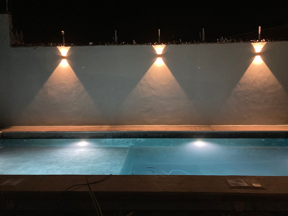 The swimming pool at night Marevilla Cozumel