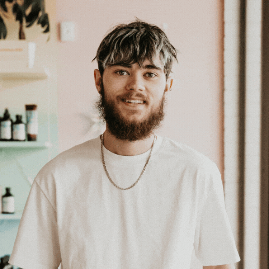 Virginia Beach curly hair cut specialist Alex Hall at Jovi Salon providing expert curl sets