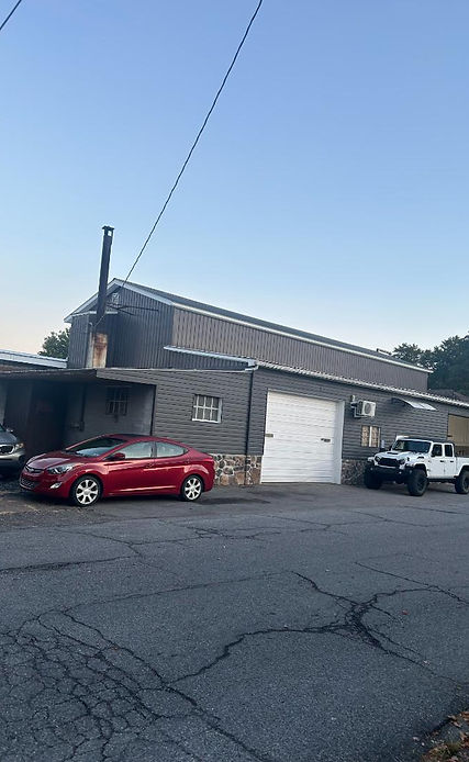 front of J&J Auto Sales & Service LLC repair shop