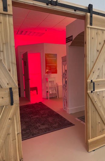 Sliding barn doors leading to the wellness treatment rooms in Cocoa FL