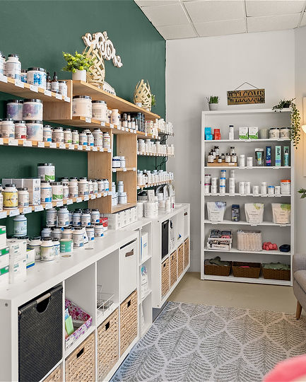 Practitioner grade supplement display shelf at Emerald Key Wellness Cocoa FL