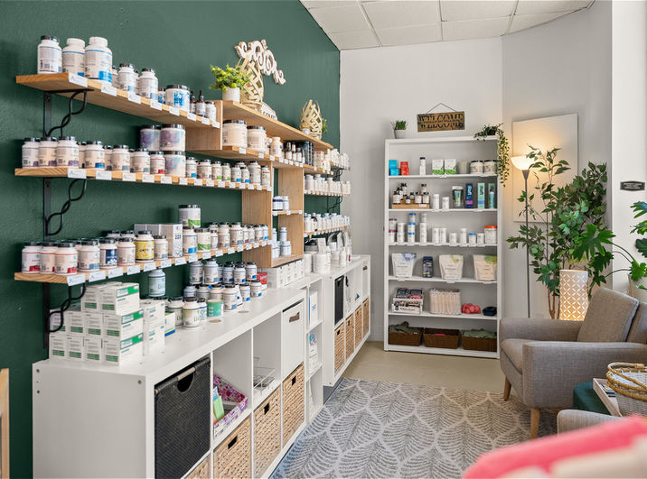 Practitioner grade supplement display shelves at Emerald Key Wellness Cocoa FL