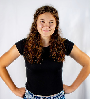 headshot of a girl in black tee shirt