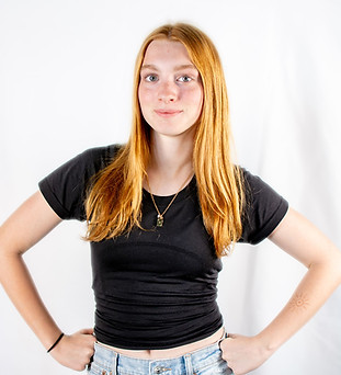 headshot of a girl in black tee shirt