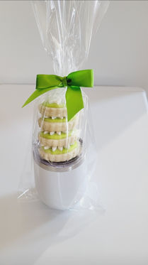 Stack of custom sugar cookies in bow-wrapped package.