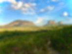 Panoramic view of Chapada Diamantina showing the tabletop mountains, rupestrian cerrado vegetation, and the open sky of the Bahian backlands