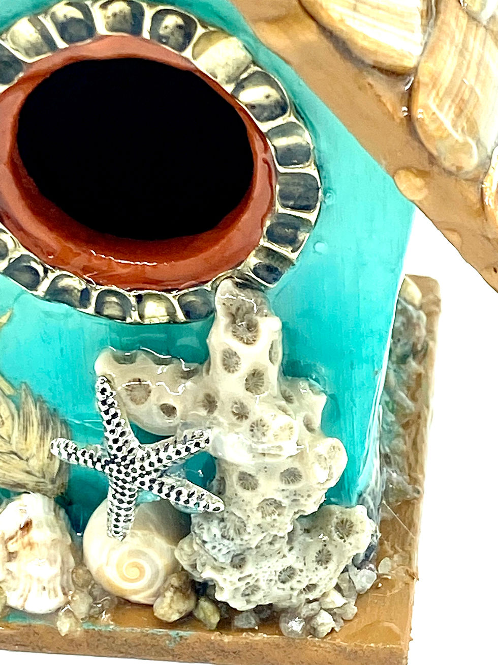 Thumbnail: Close up of mini teal birdhouse featuring the beach and with shells covering the roof.