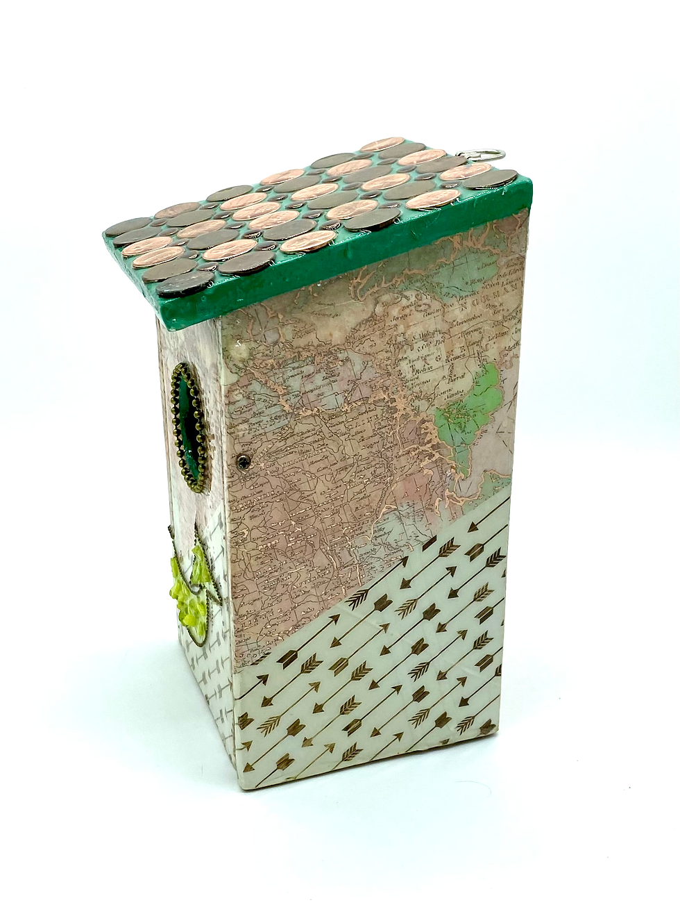 Thumbnail: Side view of a map themed bluebird box with a whimsical green arrow pointing to the entrance hole and a penny covered roof.