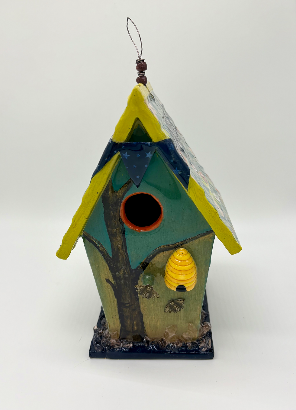 Thumbnail: Hand-painted birdhouse with tree design and yellow beehive detail on the front