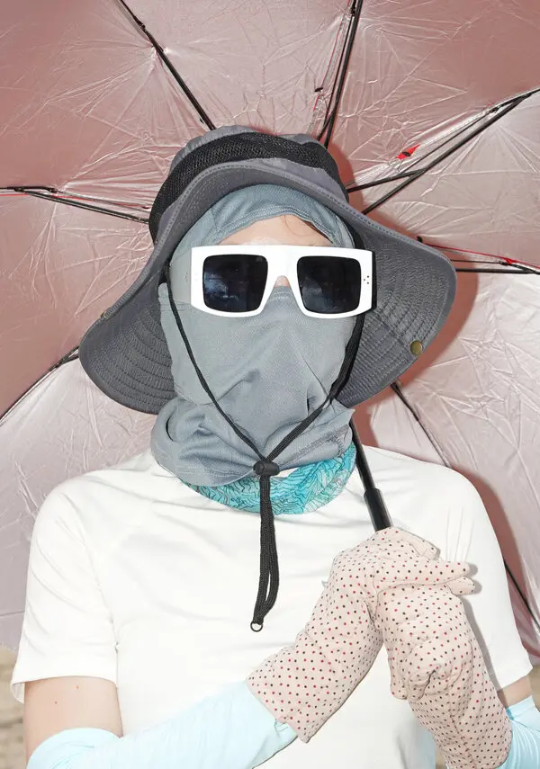 Photo of a person completely covered from the sun