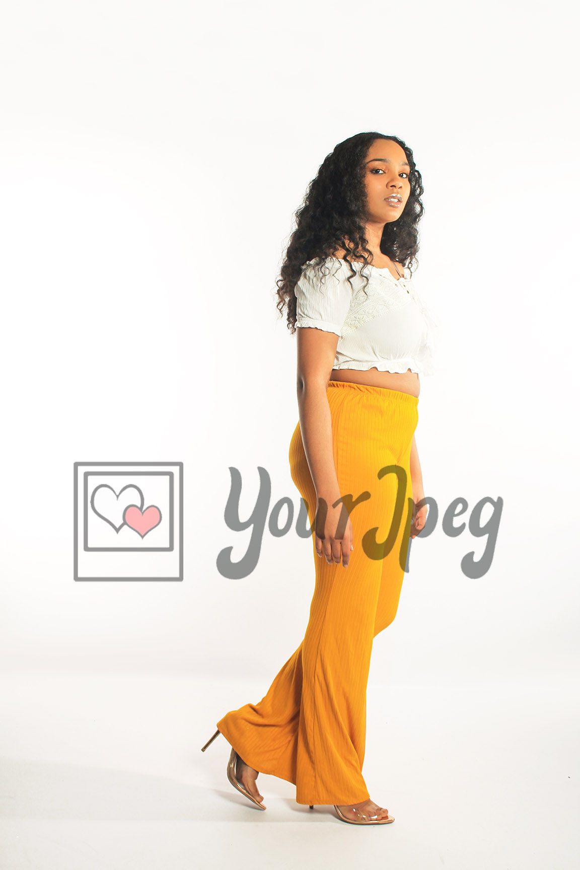 Woman in yellow pants walking