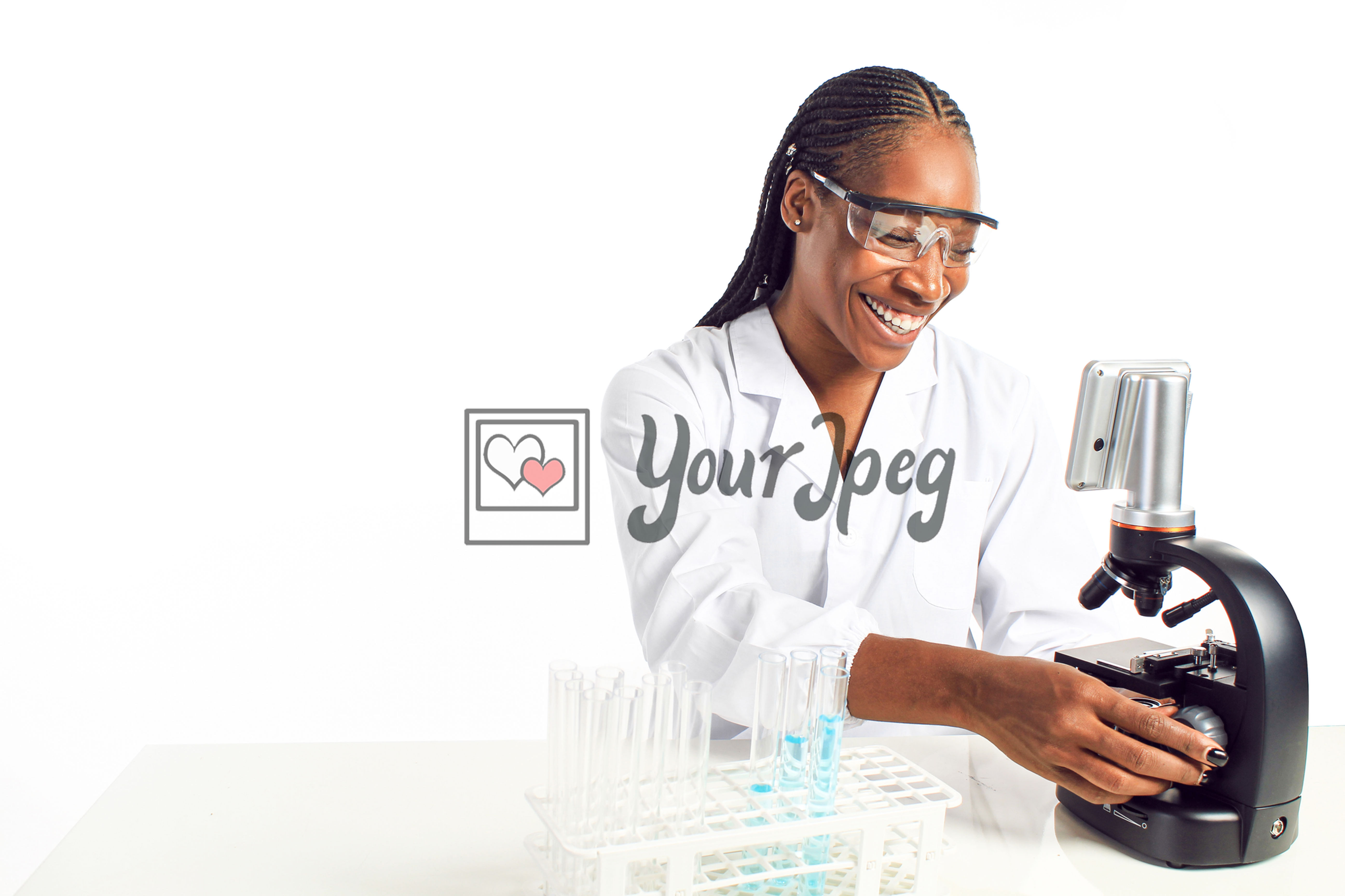 Scientist working under a microscope