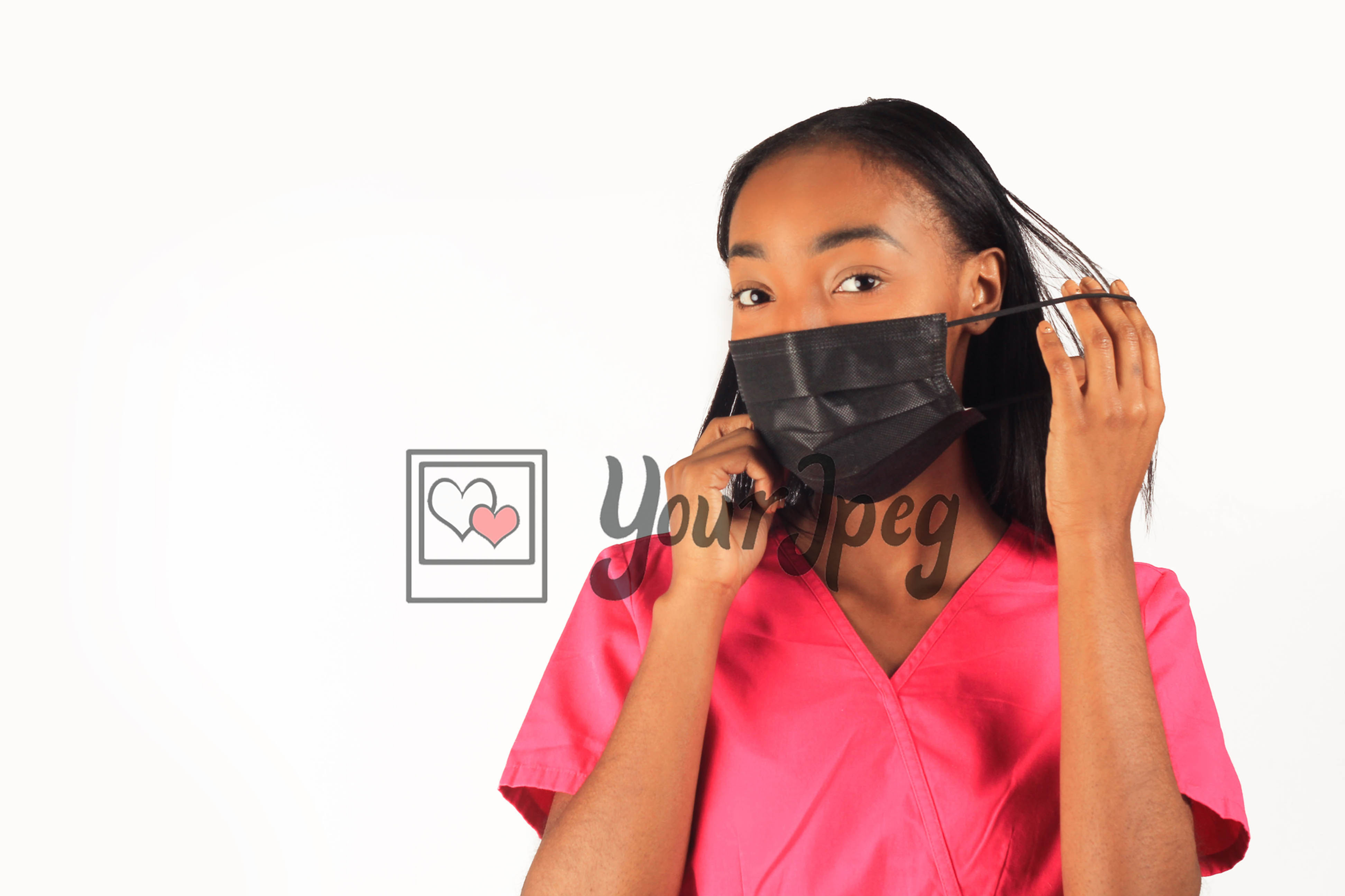 Female Nurse Taking Face Mask Off Ear